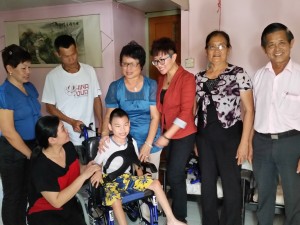 Datin Jennifer and Amy Tnay helping the unfortunate